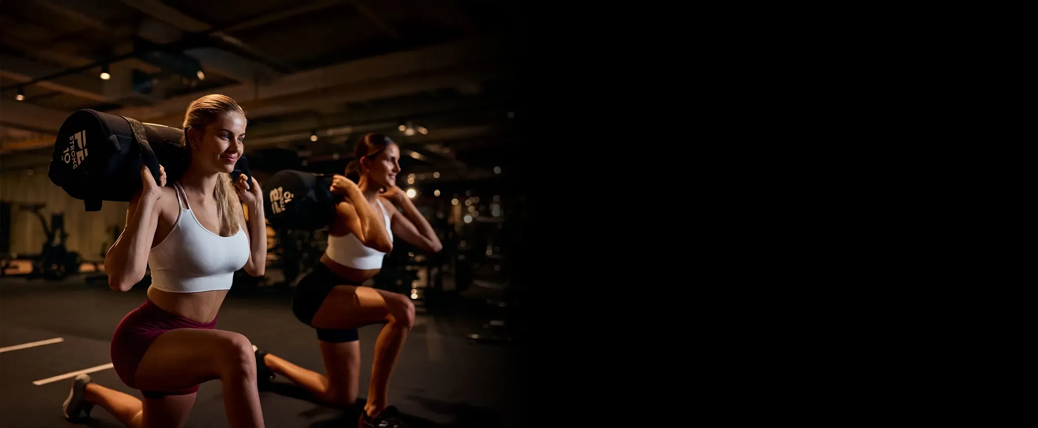Moderner Fitnessraum in einem Schweizer Fitness First Club mit hochwertigen Trainingsgeräten und sauberer Einrichtung